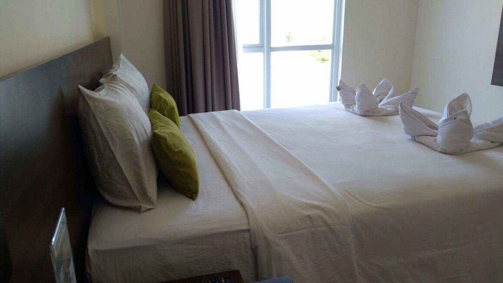 Green Eden Hotel Manado Zimmer foto