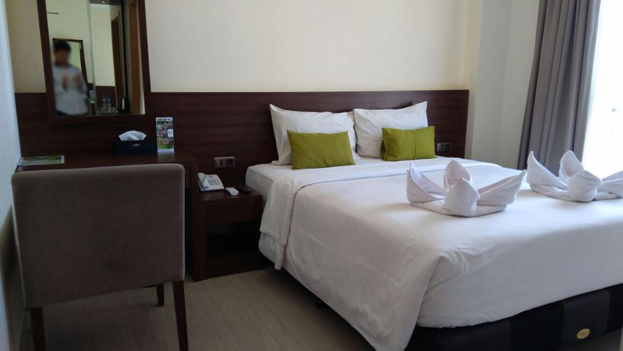 Green Eden Hotel Manado Zimmer foto